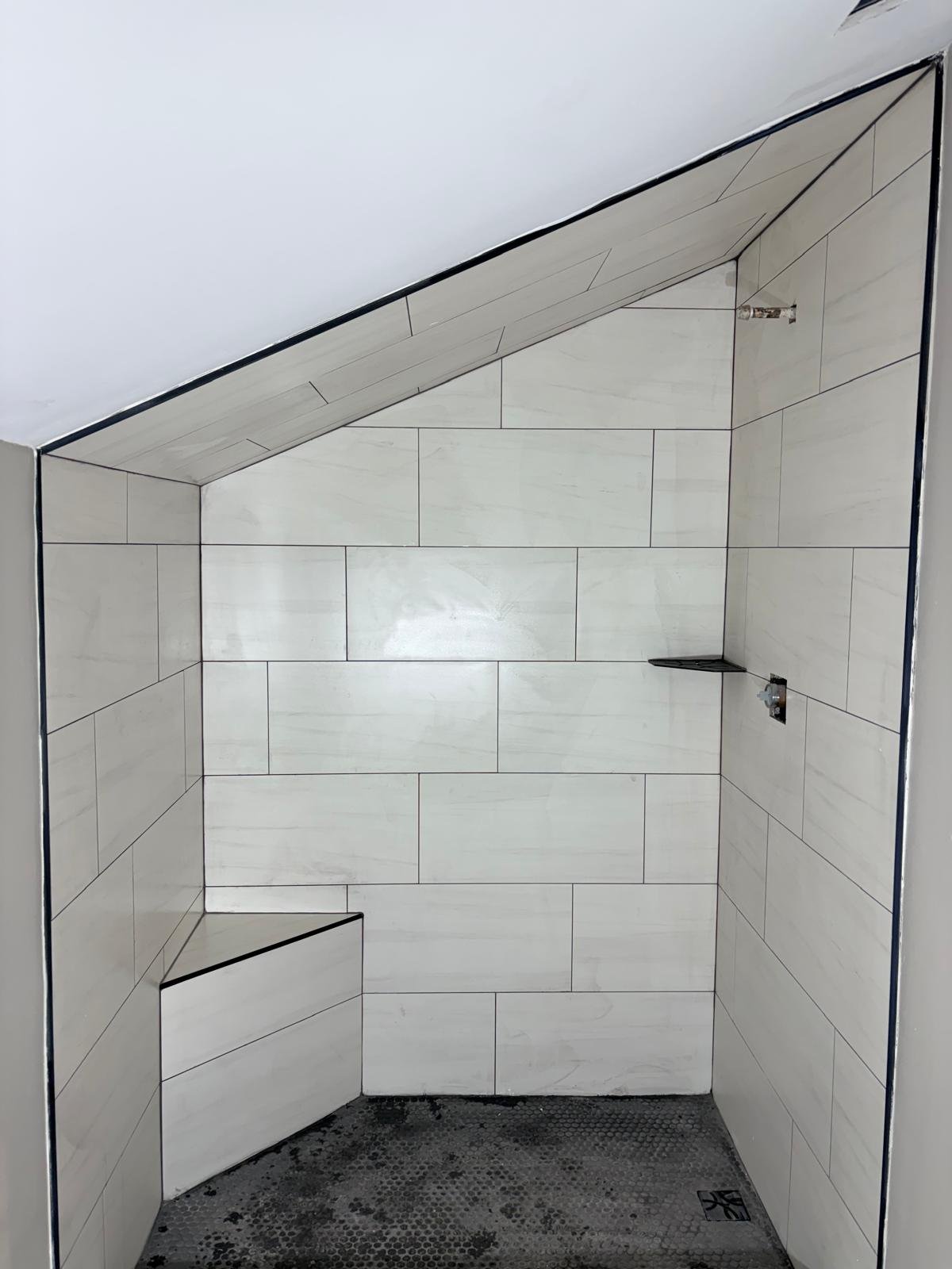 White porcelain shower with bench