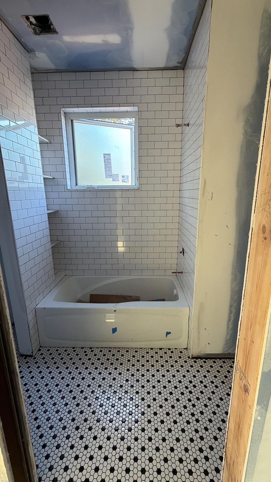 Bathroom with hexagon mosaic floor
