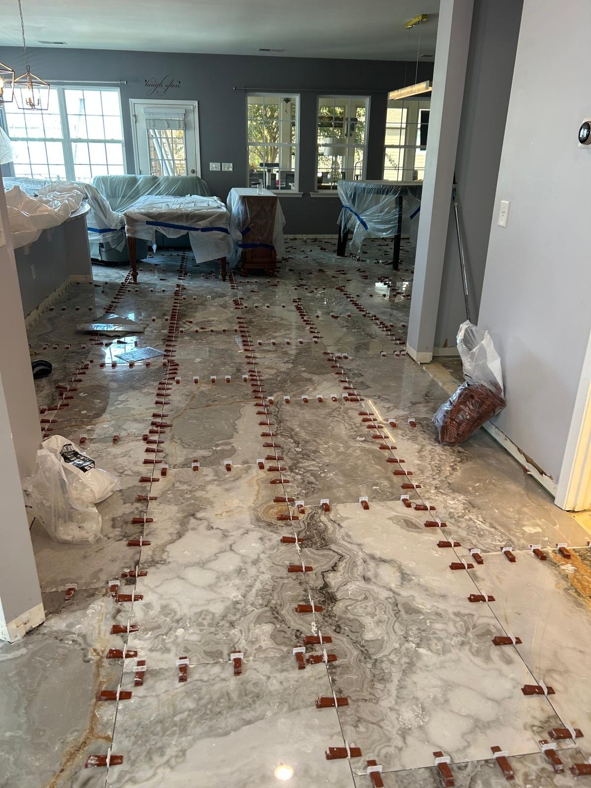 Porcelain installation with tile leveling system