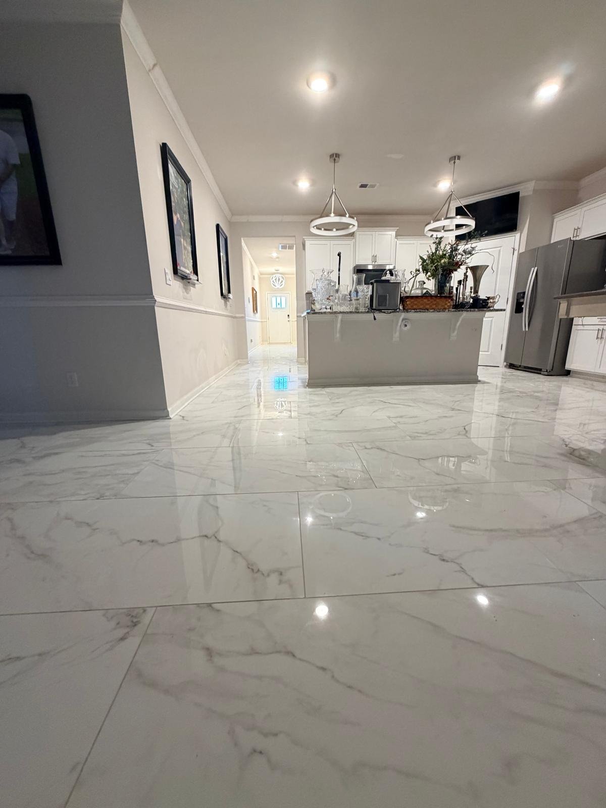 Polished marble-look porcelain in an open-concept living area