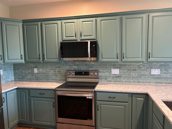 Green glass-tile backsplash