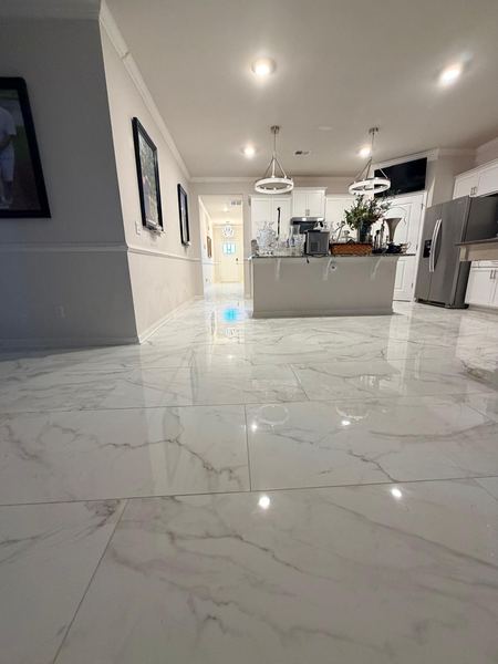 Polished marble-look porcelain in an open-concept living area