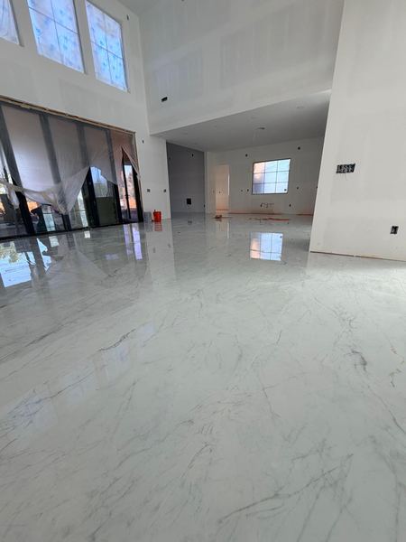 Polished porcelain in a double-height living room